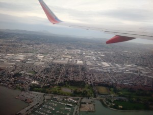 On a plane again, leaving Oakland. 