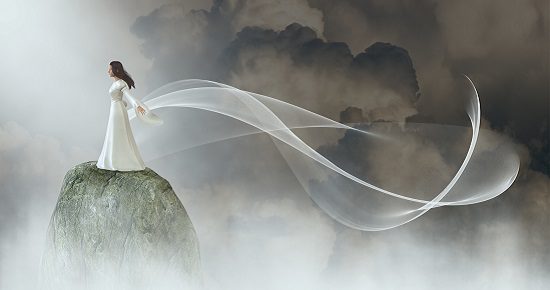 woman rock clouds veils 550x290