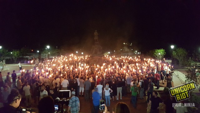 charlottesville - Unicorn Riot, wiki commons white-supremacist mob carrying torches attacks protestors