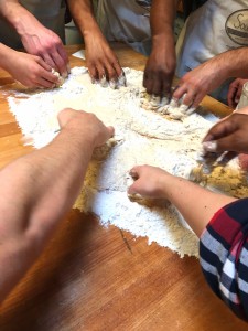 hands group baking together