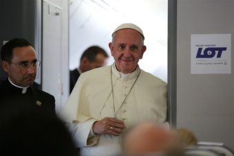 Pope Francis aboard the papal flight from Poland on July 31, 2016. Credit: Alan Holdren, CNA.