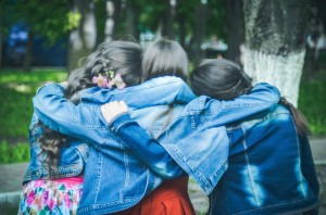 three women hugging