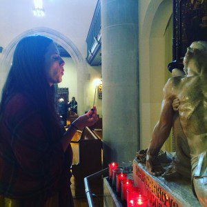 Jess prays at the Shrine of the Mother of Sorrows at St Gregory the Great in Chicago. 