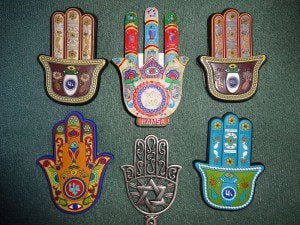 A collection of Hamsa protective amulets. Image source: Wikipedia