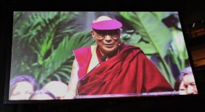 The Dalai Lama's address was projected on large video screens in Louisville. (Lori Erickson)