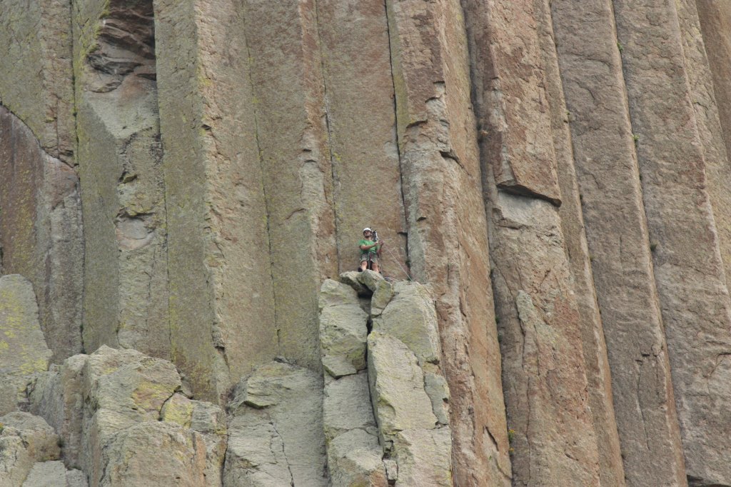 A climber ascends Devils Tower (Bob Sessions photo). 