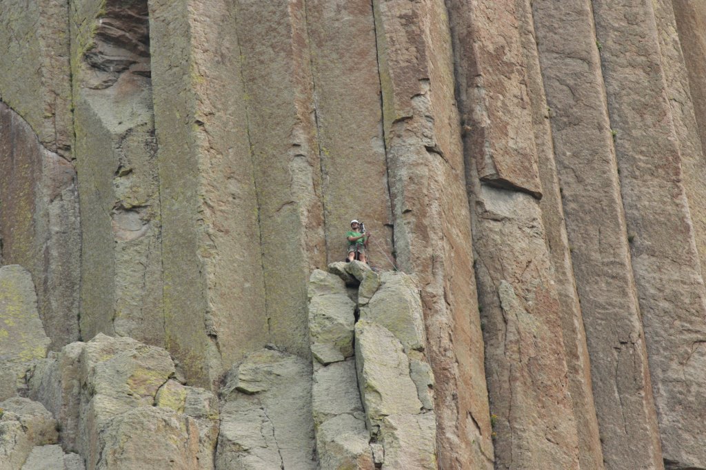 A climber ascends Devils Tower (Bob Sessions photo).