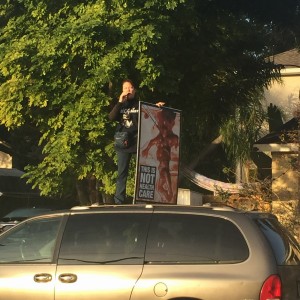 Rekigious Fanatic with Sign