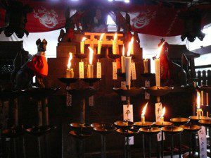 Candles at Fushimi Inari shrine, Kyoto. By 大阪 (Own work) [GFDL (http://www.gnu.org/copyleft/fdl.html) or CC BY-SA 3.0 (http://creativecommons.org/licenses/by-sa/3.0)], via Wikimedia Commons