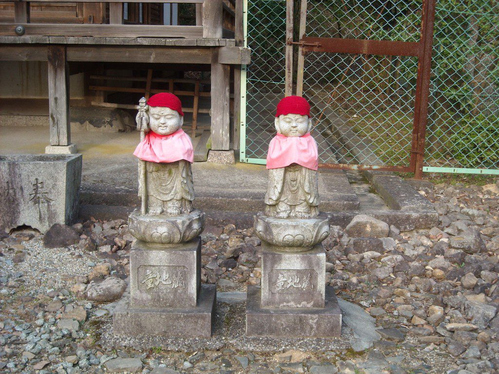 Jizo (or O-jizo-sama), the Bodhisattva whose duties include watching over departed spirits. By author.