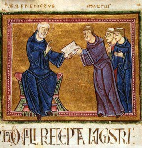 (St. Benedict delivering his Rule to St. Maurus and other monks of his order, from the Monastery of St. Gilles, Nimes, France, 1129. Source: Wikimedia, Creative Commons License).