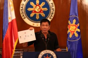 Rodrigo_Duterte_showing_diagram_of_drug_trade_network_1_7.7.16