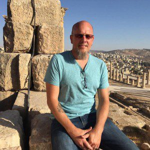 Sitting at the top of what originally was the Greek Temple of Zeus, later rebuilt as the Roman Temple of Jupiter, overlooking the ruins near Jarash, Jordan.