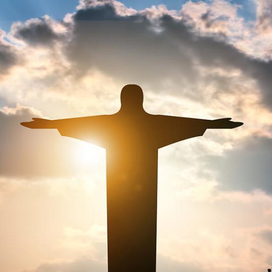 Faith-Christian-Jesus-Sky-Statue-Sun-Clouds_credit-Shutterstock