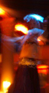 An artistically blurry shot of me dancing at Amira as a baby-dancer in college. Photo by J. Diamond.