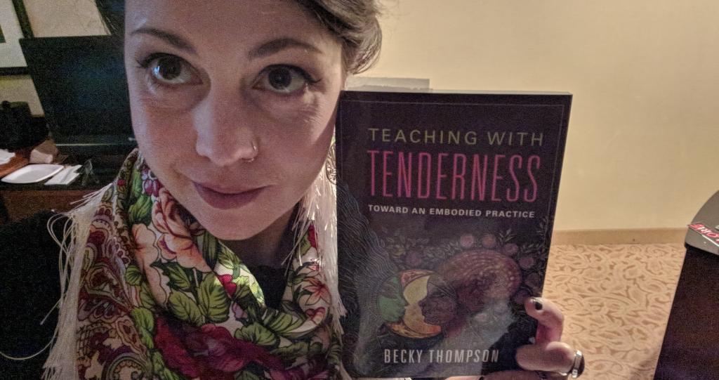 Selfie with a conference purchase, Teaching with Tenderness, a book that's been giving me great ideas to implement in the classroom.