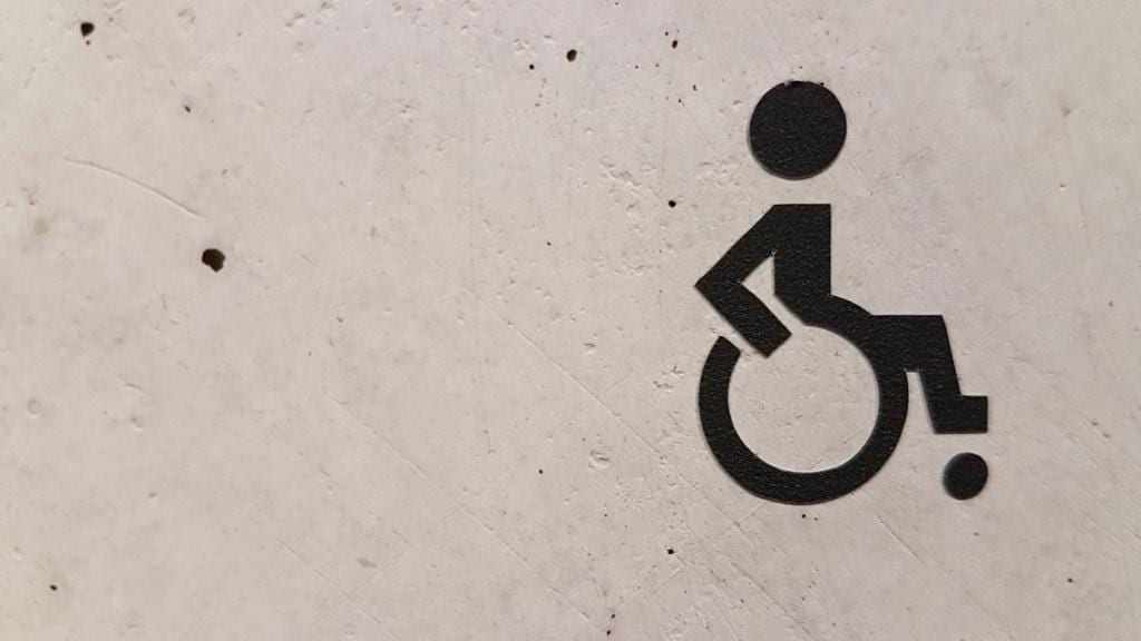 painted image of a wheelchair icon