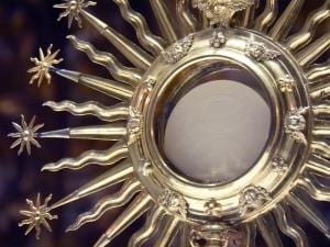 a monstrance containing the Eucharist 