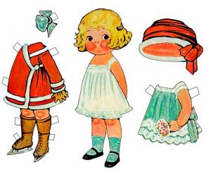 a Dolly Dingle paper doll and her dresses