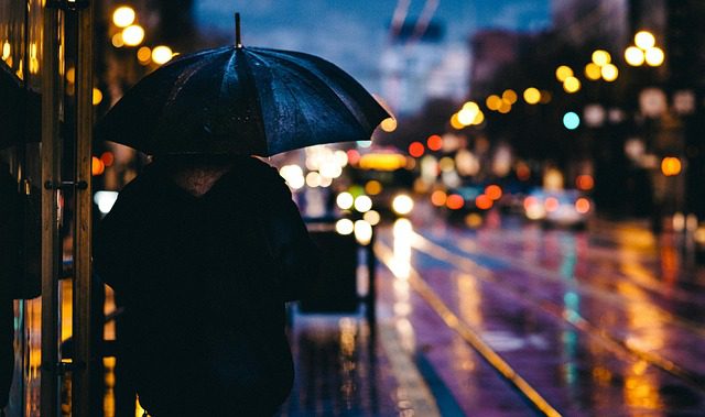 a street scene on a rainy evening