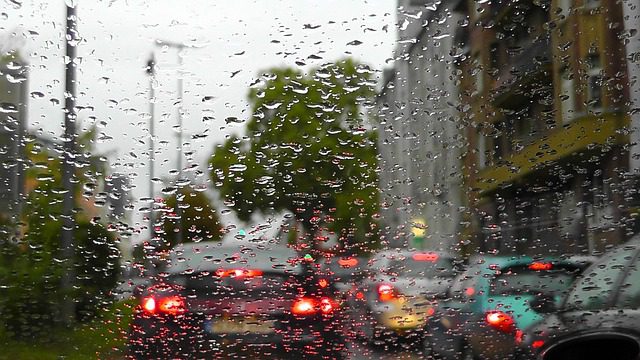 a car window splattered with raindrops