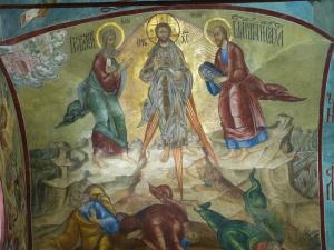 An icon of the Transfiguration, with Jesus, Moses and Elijah on the top and the apostles lying on the ground below