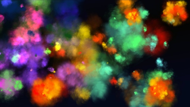 splashes of colored powder on a black background 