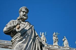 a statue of Saint Peter, the very first Pope, making the "gesture of benediction" properly. 
