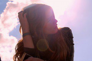 puzzled woman sun in back