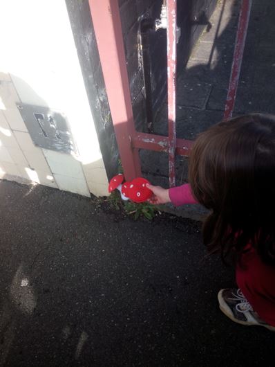 Fly agaric yarn bomb