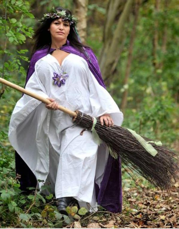 Inbaal, in her Witches' Robes and Broomstick (Besom) - She practices Witchcraft