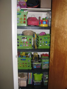 Ran's new toy closet (our old entryway closet)