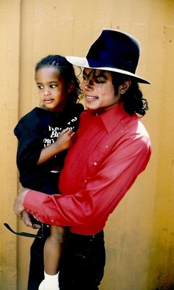 Nayanna & MJ.  How many of us have pictures of MJ carrying us? :) 