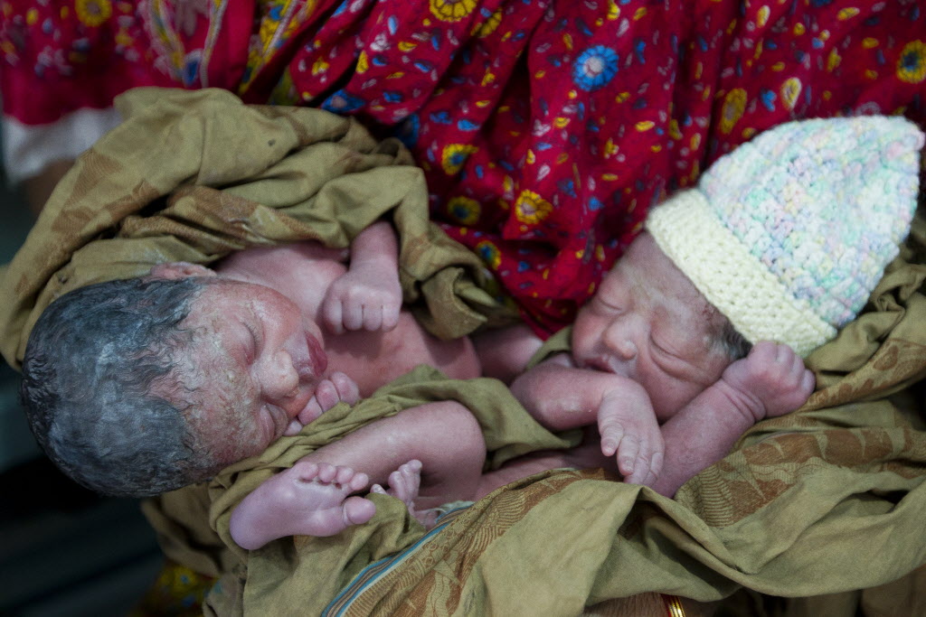 Few hours old twin babies are seen at Pailarkandi union, Baniac