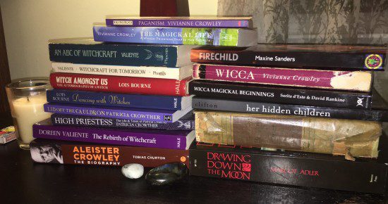 Teetering pile of books on my nightstand ~ Photo by Heron