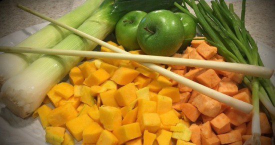 Platter with leeks, lemongrass, apples, butternut squash, sweet potatoes and green onions