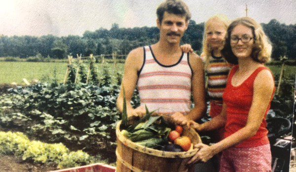 Heron and her parents in their vegetable garden, 1979