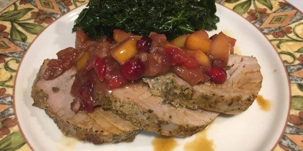Mulled Apple and Cranberry Compote served here as a garnish with roasted garlic pork tenderloin and sauteed kale with berbere and maple vinaigrette. Yeah, we feasted early a my house tonight!