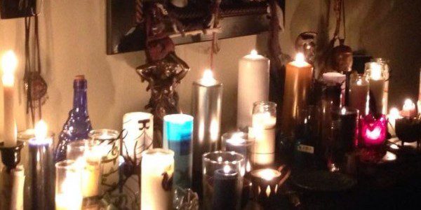 Imbolc Altar 2016 with all of our Dedication Candles alight. Photo by Heron