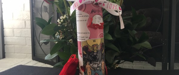 Decorated 7-day sanctuary candle as a love drawing spell. Scrap-booking papers, Lovers Tarot Image, affirmations, a mirror, felt hearts and ribbons. This makes for a fun Valentine's Day craft project. ~Heron Michelle