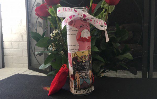 Decorated 7-day sanctuary candle as a love drawing spell. Scrap-booking papers, Lovers Tarot Image, affirmations, a mirror, felt hearts and ribbons. This makes for a fun Valentine's Day craft project. ~Heron Michelle