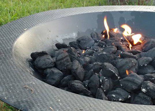 Charcoal in Fire Pit prepared for our corn roasting magick