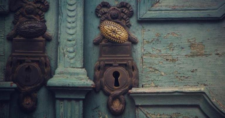 Old door with antique keyhole