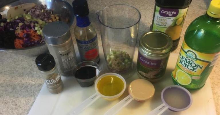 Tahini Sauce Ingredients added to a blender