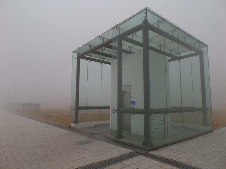 Glass Elevator in the Fog