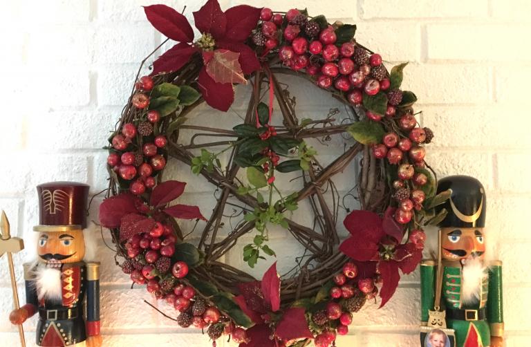 mistletoe amulet on solstice wreath