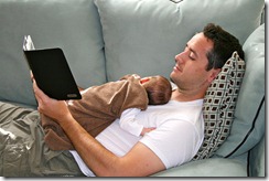 Guy Reading with Baby