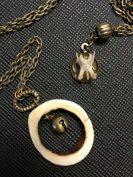 Handmade ossuary jewelry from Poking Dead Things. Photo by Coby Michael.
