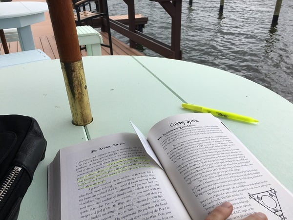 Doing some reading at The Getaway on the pier.  Courtesy of author.