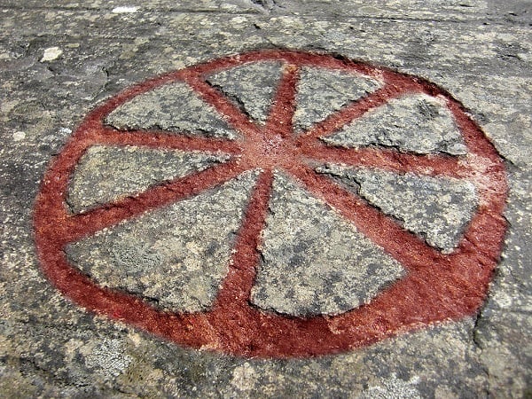 Eight Spoked Wheel Flyhov Rock. Wikimedia Common Image.